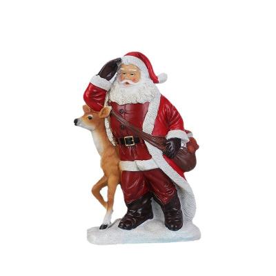 China Europe Christmas Ornaments Mount Fireplace Santa Claus Decorations Santa Claus Resin Statues Gifts And Crafts for sale