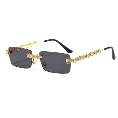 China Fashion sunglasses raw shape diamond bling rimless rhinestone trendy women men sunglasses 2021 sun glass shades for sale