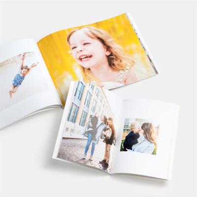 China Christmas etc customized family wedding photo hardcover keepsake book design printing for sale