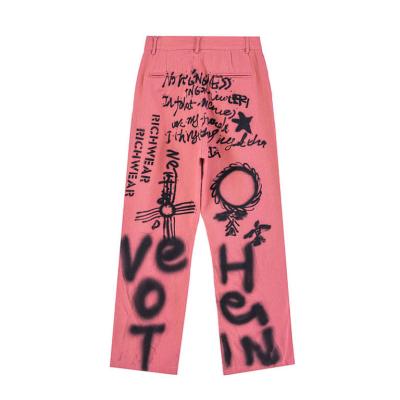 China Hip Hop Men's Casual Breathable Personality Men's Jens Pants Streetwear Letter Printed Pink Rock Fashion Foreign Jeans for sale