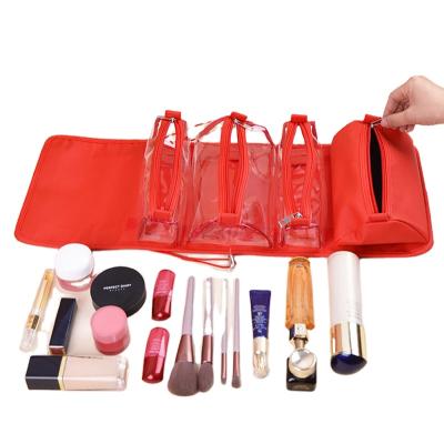 China Fashion Folding Travel Cosmetics Storage Toiletry Bag 4 in 1 Detachable Transparent Rolled Toiletry Kit Travel Organizer Makeup Bag for sale