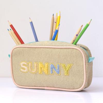 China Schools & Offices Applique Logo Large Capacity Glossy Canvas Amazon Hot Popular Pen Box Durable Waterproof Letters Pencil Case For School Office for sale