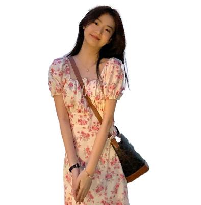 China 2023 Summer French Square Neck Retro Irregular Waist Breathable Floral Dress Showing Coffee Break White Floral Skirts For Women for sale