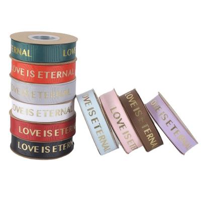 China Roll De Navidad Rollo De Cinta Para Envolver Regalos Holographic Tan En Relieve Satin Grosgrain Merry Christmas Gift Ribbon Printer for sale