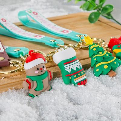 China 2022 Shiny Shining New Christmas Key Chain Christmas Tree Santa Claus Snowman Soft Plastic Pendant Gift for sale