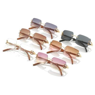 China 100% 400 Latest Protection Vintage Retro Leopard Gradinent Women Sun Glasses Unique Rimless Frameless Sun Glasses Leading UV Clear for sale