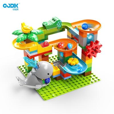 China OUDK Eco-friendly Material Toys Puzzle 84pcs Creative Whale Slide Educational Building Blocks Toys Children's Games for sale