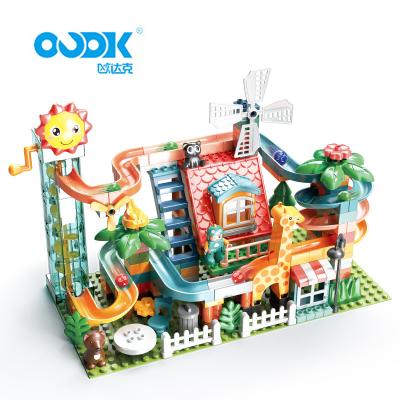 China OUDK Eco-friendly Material Toys Amazon Best Selling Assembly Toys Plastic Circulation Electric Spiral Slide Building Block Sets For Kids for sale