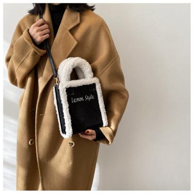 China soft & Faux Fur Fabric Winter Fashion Words Comfortable Suede Embroidered Handbags Square Cross - Body Bag for sale