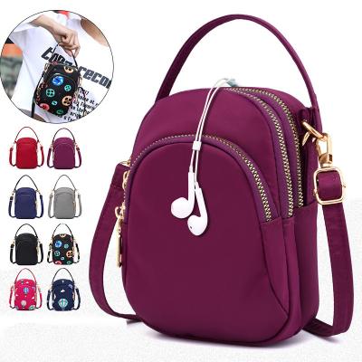 China Lots of Cross Shoulder Sports Girl Cell Phone Shopping Traveling Waterproof Nylon Small Pockets Casual Bags - Body Bags Pinch For Women for sale