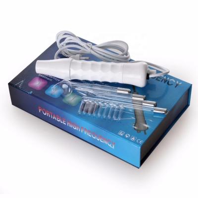 China 2021 Newest Anti-Puffiness Hand Holding 4 in 1 Portable Galvanic Violet Ray Wand High Frequency Facial Machine for sale