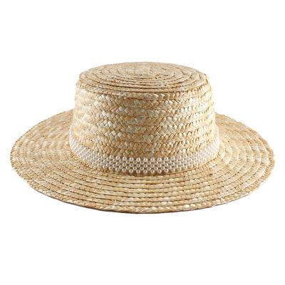 China Outdoor Wide Birm Round Hat Boater Fashion Floppy Hat Pearl Straw Hat Natural Wheat Grass Flat Top Straw Hat for sale