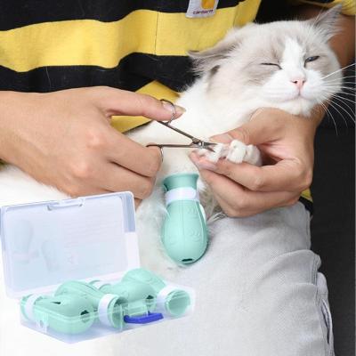 China Adjustable Multifunctional Pet Viable Cat Paw Claw Cover Foot Silicone Rubber Anti Scratch Protector for Bathing Cleaning Grooming for sale