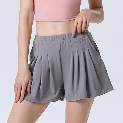 China Ei Brand Breathable Sport Clothes Yoga Shorts Pockets Pleated Tennis Skirts Young Girls Athletic Shorts Loose Fit Fitness Skirt Shorts for sale