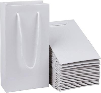 China Recyclable white paper bags with handle for sale