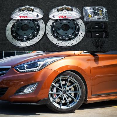 Cina Pinza da corsa a 4 pistoncini Hyudnai kit freno grande 355 * 32 mm disco da corsa ad alto tenore di carbonio e pastiglie freno per cerchione da 18 pollici ELANTRA in vendita