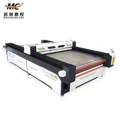 China Laser CUTTING CO2 MC1630 Automatic Feeding Fabric And Garments Industry Laser Cutting Machine for sale