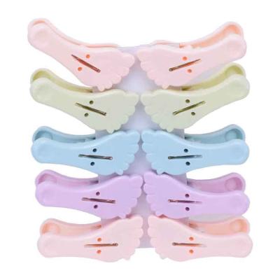 China Wholesale Plastic Clothespin Clip Four Colors Clothespins 10 Pcs 1 Set Plastic Beach Towel Clips Clothes Clips for sale