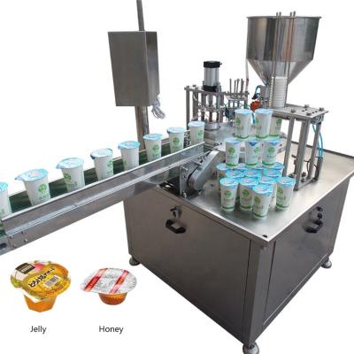 China Promotional Automatic Rotary Beverage Cup Jelly Cup Filling Sealing Machine for sale