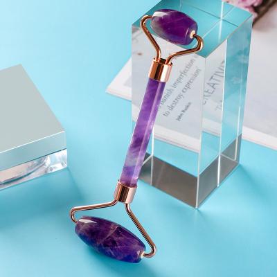 China Anti-Puffiness Face Quartz Face Roller Slimming 100% Natural Jade Stone Dual Head Facial Stone Purple Jade Roller Hand Massage Roller for sale