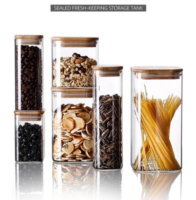 China Sustainable Square Glass Storage Jar With Wooden Lid for sale