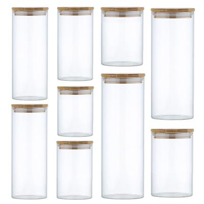 China Wholesales Mini High Quality Clear Glass Spice Storage Stocked Jar With Bamboo Cork Lid for sale