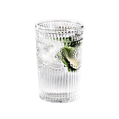 China New Classic/Postmodern Machine Made Thick Sunflower Embossed Tumbler Whiskey Glass for sale