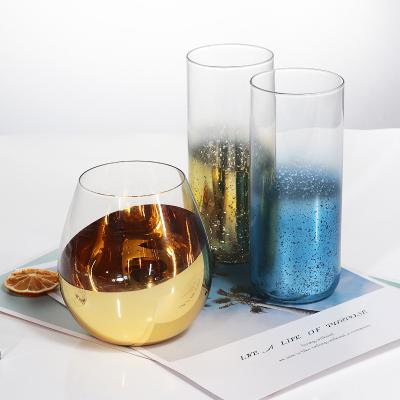 China New Classic/Postmodern Wholesale Creative Electric Blue Gold Egg Shaped Cylinder Water Juice Beer Glass Cup for sale