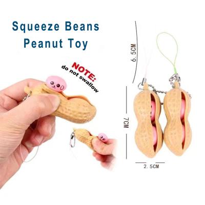 China Squeezable Hot Squeezable Cute Beans Decompression Silicone Toys Fidegt Main Sale Peanut Chain Toy for sale