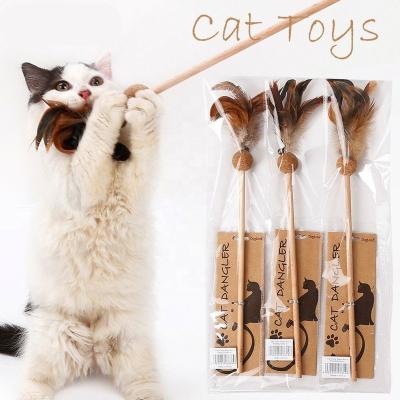 China Eco - Friendly Feather Wood Sustainable Cat Toy With Bells Teeth Toy Stick for sale