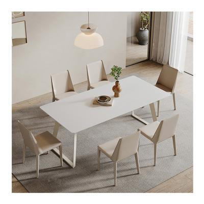 China Adjustable (other) Light luxury dining tables modern minimalist household stainless steel slate dining table set Cream style Dining Room Furniture for sale