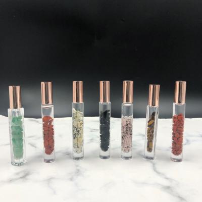 China Personal Care Roller Bottles for Oils Gemstone Roller Clear Bottles with Crystal Chips Inside for sale