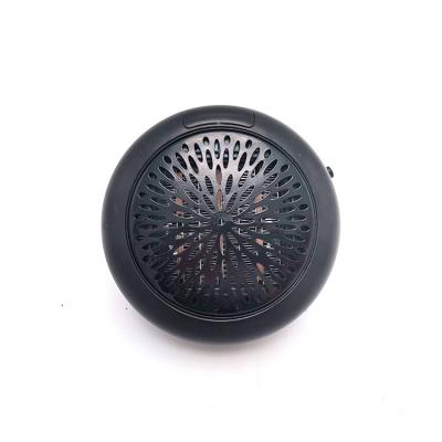 China New design wall-outlet round mini overheating protection portable electronic PTC heater for room for sale