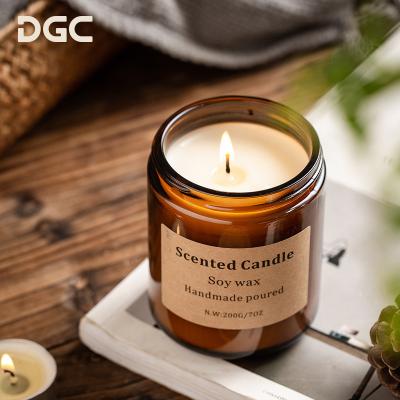 China Custom Festival Decoration Pick DGC Logo Home Decoration Used Glass Candle Luxury Brown Jars Soy Wax Scented Candles With Lid for sale