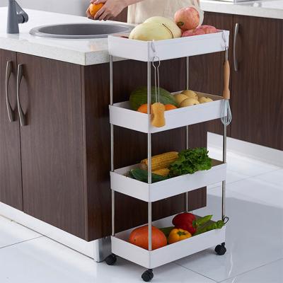 China Sustainable Wholesale Plastic Fruit Storage and Bathroom Storage Vegetable Rack with Wheels en venta