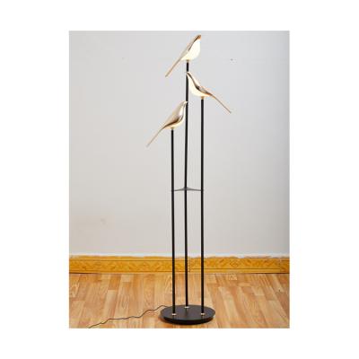 China Adjustable Modern Magpie Small Creative Minimalist Led Floor Lamps For Living Room for sale