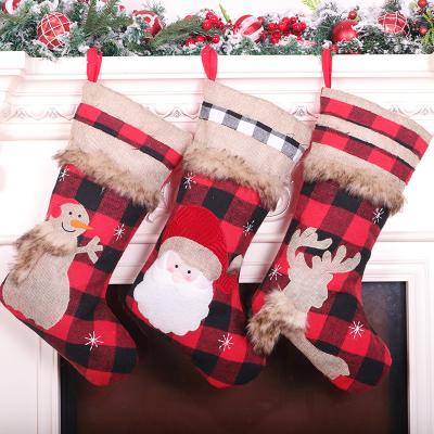 China Custom Wholesale Sublimation Snowman Gift Bag Gift Stocking Cloth Luxury Christmas Stockings for sale