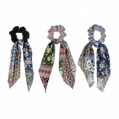 China 2021 Wholesale Price Designer Geometric Pattern Printed Cloth Hair Decarated Fashionable Soft Bow With Long Tail Hair Accessories for sale