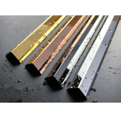 China 8K Mirror Polished Champaign Color 304 201 L Shape Tile Edge Trim Line For Hotel Interior Decoration for sale