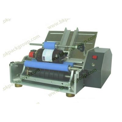 China High Efficiency Semi-automatic Cold Wet Glue Manual Food Round Bottle Labeling Machine for sale