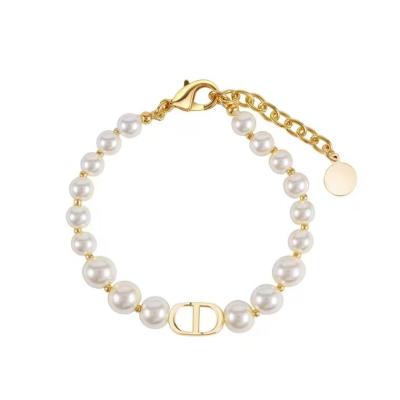 China Tremdy Trendy Jewelry Couples Bracelet Famous Brand CD Fashion Jewelry Freshwater Pearl 18k Gold Plated CD Women Pearl Charm Bracelet for sale