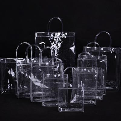 China 2021 Fashion Style Trendy Clear PVC Beach Handle Transparent Tote Bag For Promotional Shopping Gift With Handles And Latch for sale