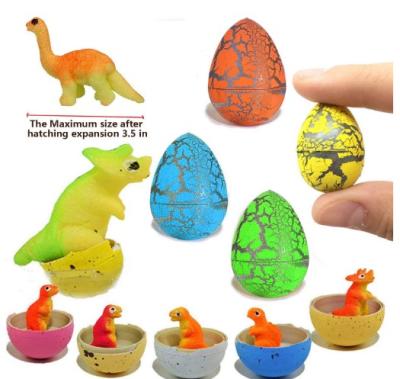 China Magic Dinosaur Eggs Hatch Grow Filled With Mini Dinosaur Toys Kids Easter Gift Game 2*3 for sale