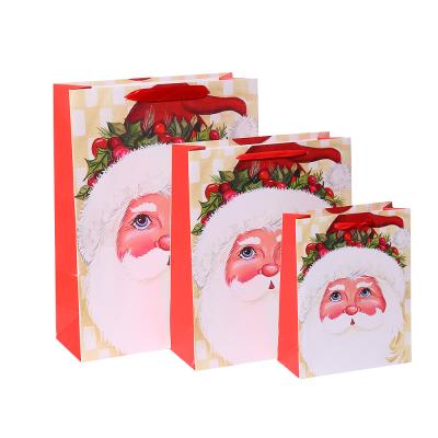 China Recyclable Custom Paper For Gift Shopping Bag With Ribbon Christmas Decoration Supplies for sale