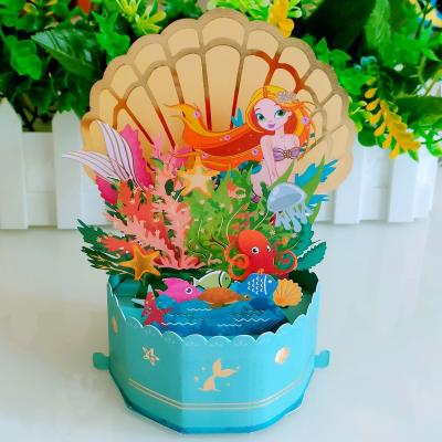 China Original Europe Design 3d Beauty Mermaid Pop Up Box Card Printed Paper Pop Up Birthday Greeting Card for sale