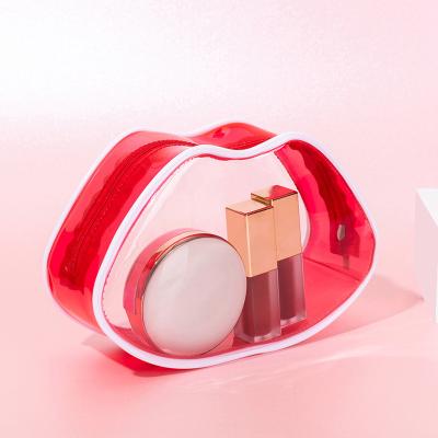 China Waterproof Fashion Red Lip Shaped Clear Beauty Cosmetic Bag Makeup Pouch Women Girls Transparent Clutch Make Up Bags for sale