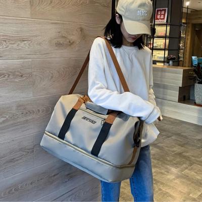 China Multifunctional Purpose Fashion Travel Bags For Women Men Large Capacity Sports Bag Waterproof Female Messenger Bag Dry And Wet Dropshipping for sale