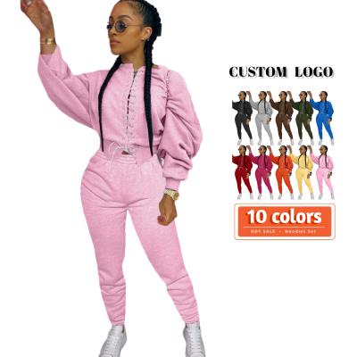 China Viable F113 2021 Pink Color Women's Bandage Sweatshirt And Sweatpants Two Piece Suit Set LOGO Custom Sweatsuits for sale