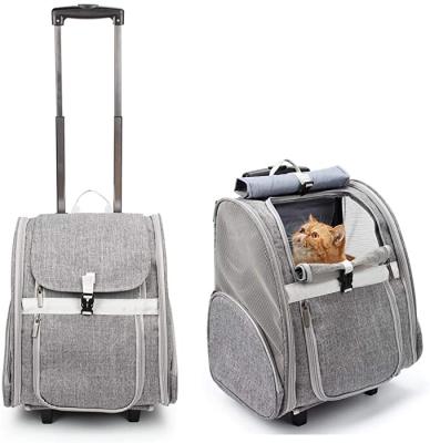 China Breathable Pet Rolling Carrier Dog Backpack With Wheels Cats Puppies Travel Bag With Wheels Dog Trolley Airline Approved for sale