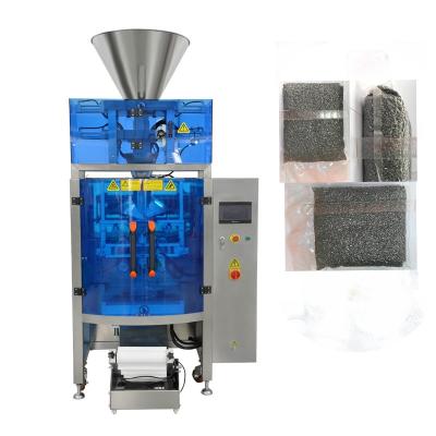 China Economic Price Beverage Rice Plastic Bag Automatic Vacuum Packing Machine For Rice Industry for sale